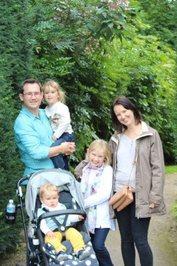 A family posing for a picture in a hedged garden, "me and mine" September 2015.