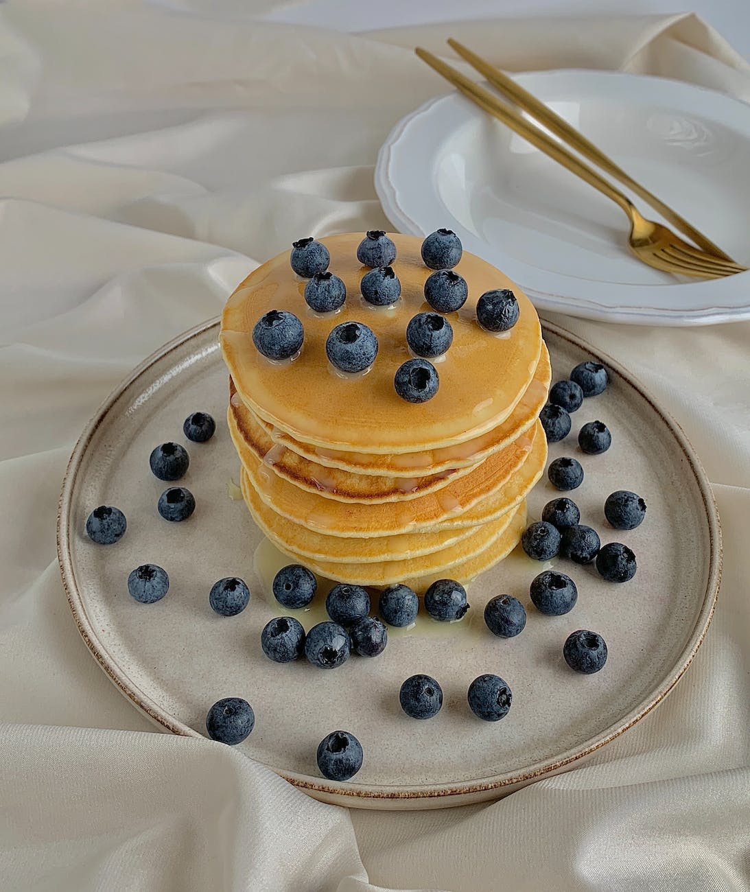 blueberries on top of pancakes