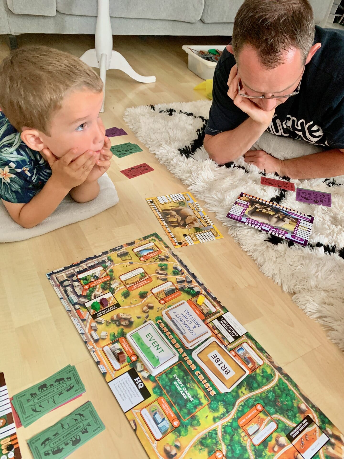 family playing conservation crisis game
