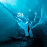 Iceland: The Perfect Destination for a Romantic Getaway man staring deep in the sea.