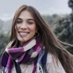 brown haired woman wearing a scarf