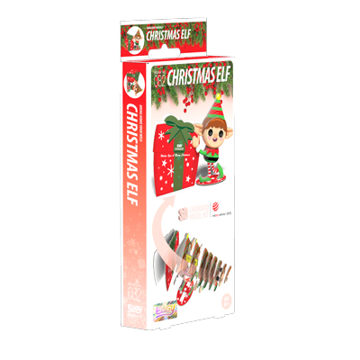 A christmas elf kit with scissors and a gift box.