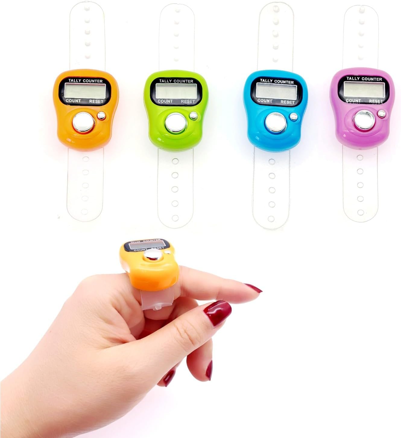 A hand wears a blue finger tally counter, a must-have knitting tool, whilst four similar counters in yellow, green, blue, and purple with white adjustable straps showcase essential knitting accessories above.