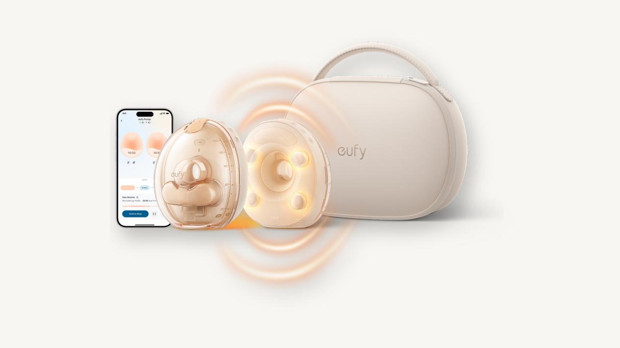 A wireless breast pump with its case, shown alongside a mobile phone displaying a related app interface.